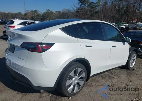 2023 Tesla Model Y Awd/Long Range Dual Motor All-Wheel Drive z USA, uszkodzony, nr VIN 7SAYGDEE5PA064167